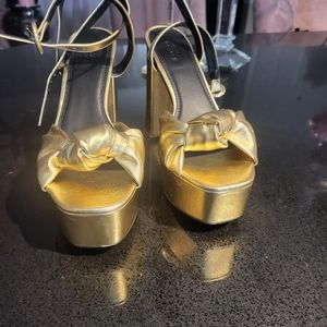 Gold platform heels